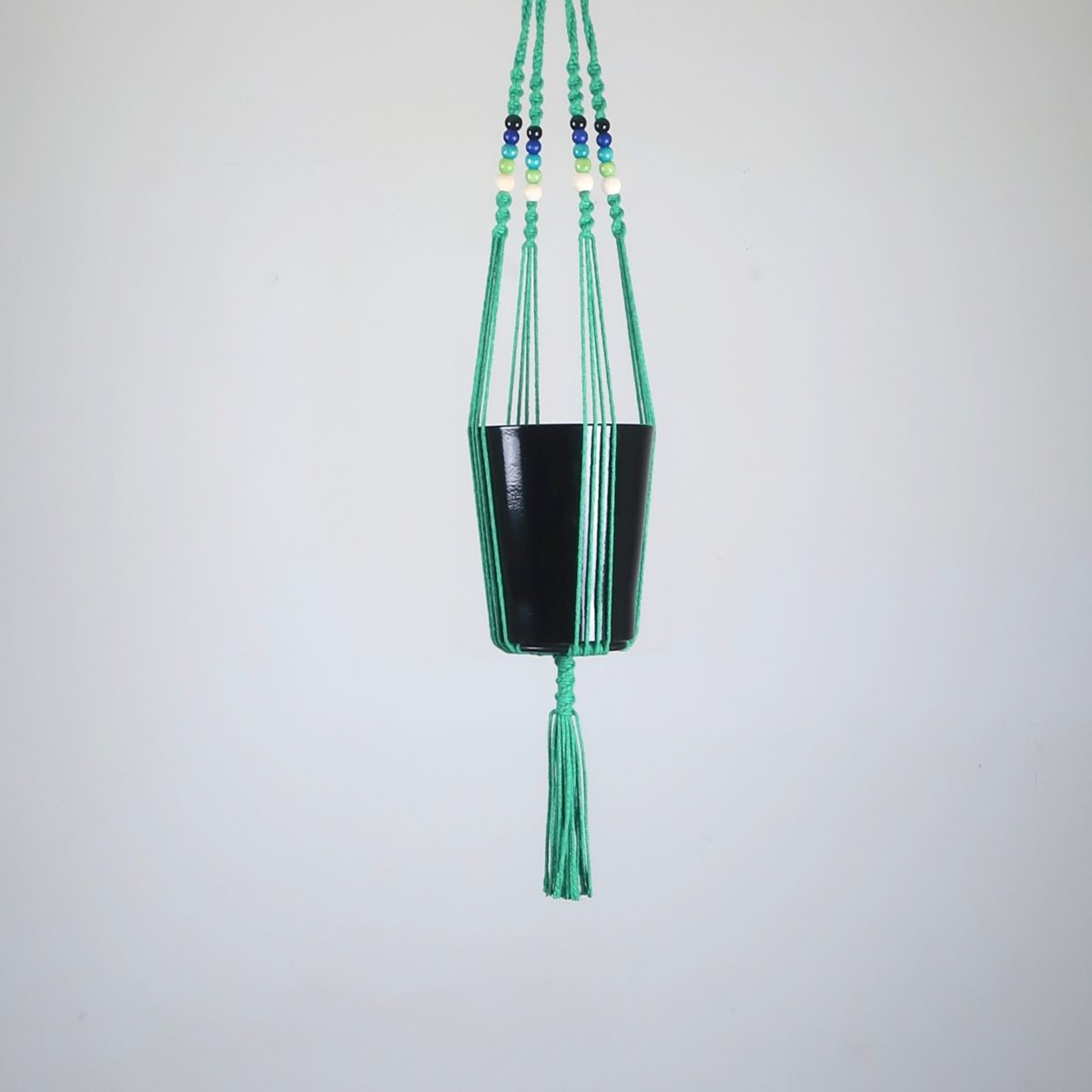 suspension en macramé vert